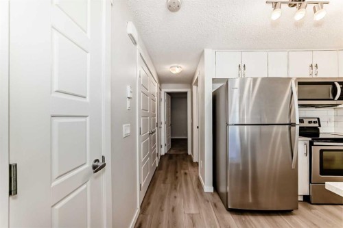 109 Cranbrook Square Se, Calgary, AB - Indoor Photo Showing Kitchen With Stainless Steel Kitchen