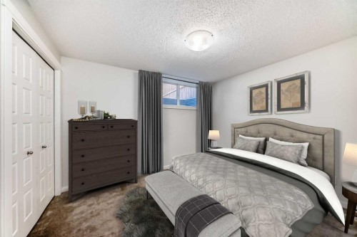 109 Cranbrook Square Se, Calgary, AB - Indoor Photo Showing Bedroom