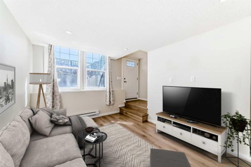 109 Cranbrook Square Se, Calgary, AB - Indoor Photo Showing Living Room