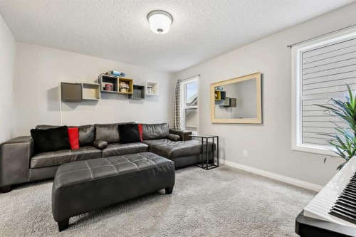 154 Masters Point Se, Calgary, AB - Indoor Photo Showing Living Room