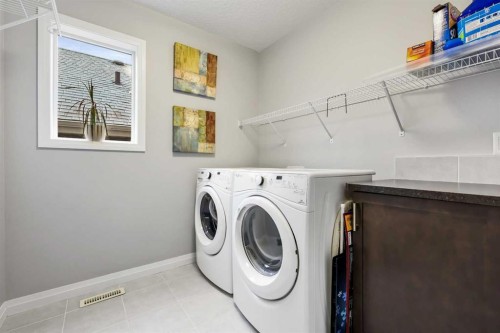 154 Masters Point Se, Calgary, AB - Indoor Photo Showing Laundry Room