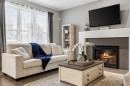 154 Masters Point Se, Calgary, AB  - Indoor Photo Showing Living Room With Fireplace 