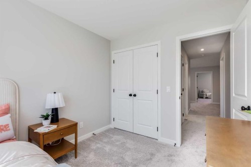 4058 Sawgrass Street Nw, Airdrie, AB - Indoor Photo Showing Bedroom