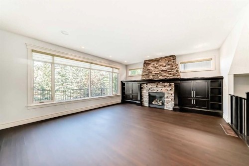 38 Aspen Meadows Park Sw, Calgary, AB - Indoor Photo Showing Living Room With Fireplace