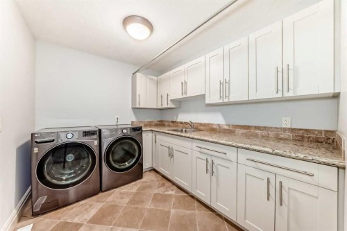 38 Aspen Meadows Park Sw, Calgary, AB - Indoor Photo Showing Laundry Room