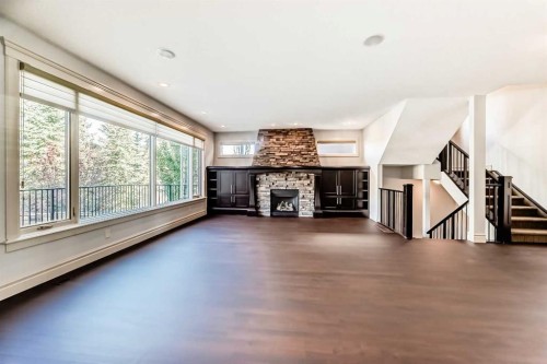 38 Aspen Meadows Park Sw, Calgary, AB - Indoor Photo Showing Living Room With Fireplace
