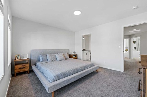 511 Wolf Creek Way Se, Calgary, AB - Indoor Photo Showing Bedroom
