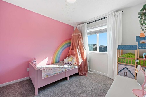 511 Wolf Creek Way Se, Calgary, AB - Indoor Photo Showing Bedroom