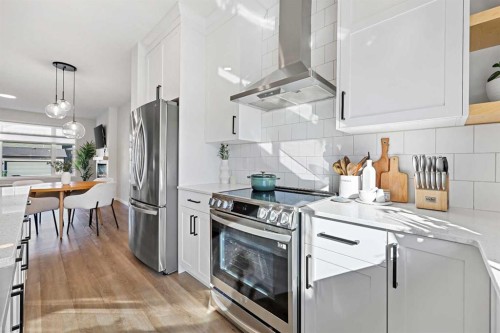 511 Wolf Creek Way Se, Calgary, AB - Indoor Photo Showing Kitchen With Stainless Steel Kitchen With Upgraded Kitchen