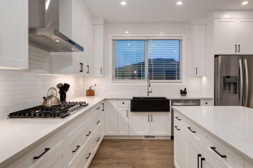 108 Harmony Circle, Rural Rocky View County, AB - Indoor Photo Showing Kitchen With Upgraded Kitchen