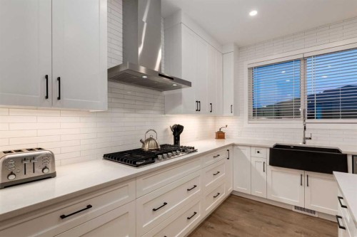 108 Harmony Circle, Rural Rocky View County, AB - Indoor Photo Showing Kitchen With Upgraded Kitchen
