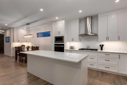 108 Harmony Circle, Rural Rocky View County, AB - Indoor Photo Showing Kitchen With Upgraded Kitchen