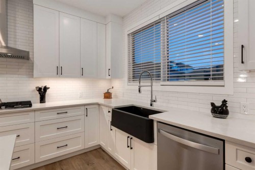 108 Harmony Circle, Rural Rocky View County, AB - Indoor Photo Showing Kitchen With Upgraded Kitchen