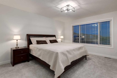 108 Harmony Circle, Rural Rocky View County, AB - Indoor Photo Showing Bedroom