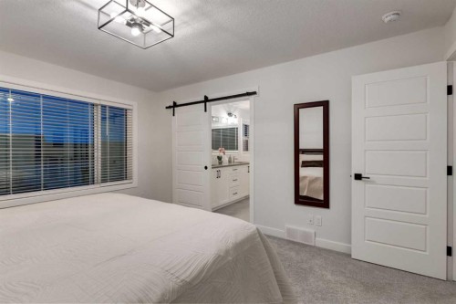 108 Harmony Circle, Rural Rocky View County, AB - Indoor Photo Showing Bedroom
