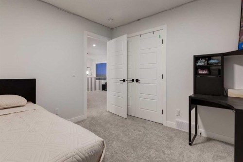 108 Harmony Circle, Rural Rocky View County, AB - Indoor Photo Showing Bedroom