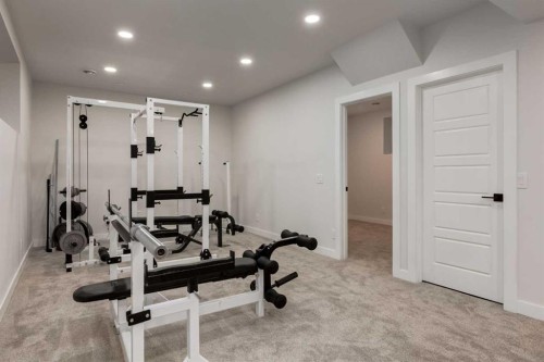 108 Harmony Circle, Rural Rocky View County, AB - Indoor Photo Showing Gym Room