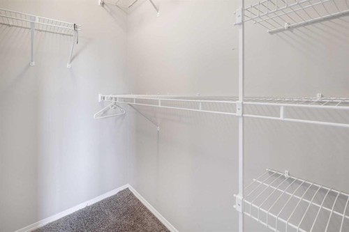 136 Evansborough Way Nw, Calgary, AB - Indoor With Storage