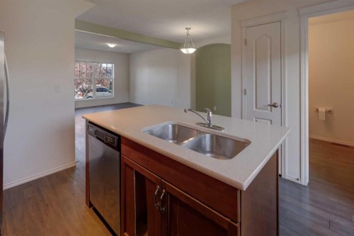 136 Evansborough Way Nw, Calgary, AB - Indoor Photo Showing Kitchen With Double Sink