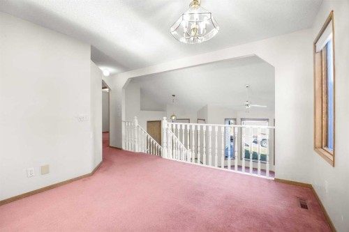 51 Macewan Park Rise Nw, Calgary, AB - Indoor Photo Showing Other Room