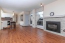 523-860 Midridge Drive Se, Calgary, AB  - Indoor Photo Showing Living Room With Fireplace 