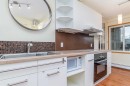 523-860 Midridge Drive Se, Calgary, AB  - Indoor Photo Showing Kitchen With Double Sink 
