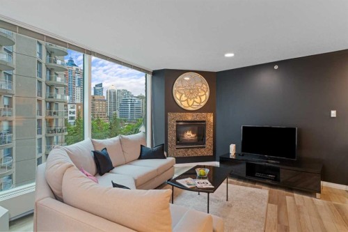 501-837 2 Avenue Sw, Calgary, AB - Indoor Photo Showing Living Room With Fireplace