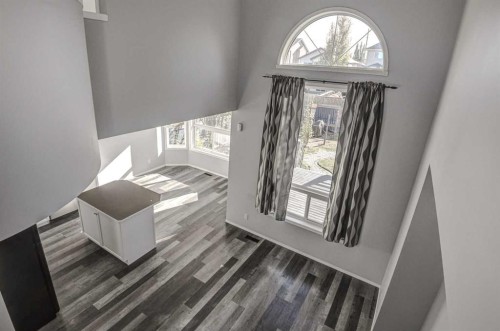 61 Everstone Avenue Sw, Calgary, AB - Indoor Photo Showing Other Room