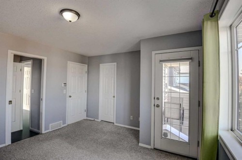 61 Everstone Avenue Sw, Calgary, AB - Indoor Photo Showing Other Room