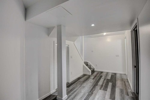 61 Everstone Avenue Sw, Calgary, AB - Indoor Photo Showing Other Room
