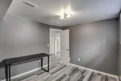 61 Everstone Avenue Sw, Calgary, AB - Indoor Photo Showing Other Room