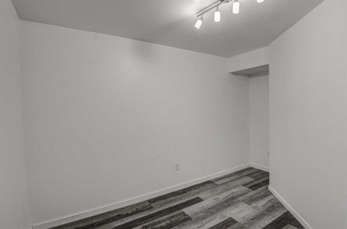 61 Everstone Avenue Sw, Calgary, AB - Indoor Photo Showing Other Room