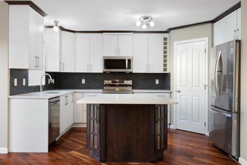 2125 Luxstone Boulevard Sw, Airdrie, AB - Indoor Photo Showing Kitchen
