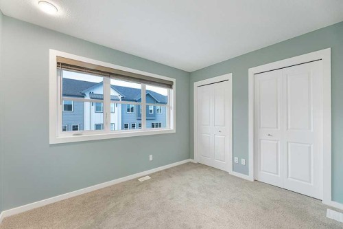 25 Spring Willow Close Sw, Calgary, AB - Indoor Photo Showing Other Room