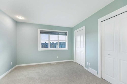 25 Spring Willow Close Sw, Calgary, AB - Indoor Photo Showing Other Room