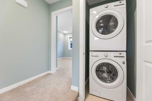 25 Spring Willow Close Sw, Calgary, AB - Indoor Photo Showing Laundry Room