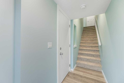 25 Spring Willow Close Sw, Calgary, AB - Indoor Photo Showing Other Room