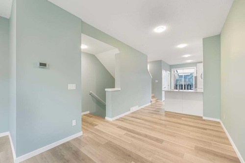 25 Spring Willow Close Sw, Calgary, AB - Indoor Photo Showing Other Room