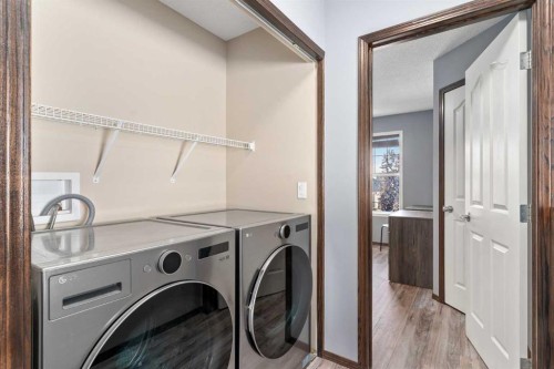 210 Cranberry Place Se, Calgary, AB - Indoor Photo Showing Laundry Room