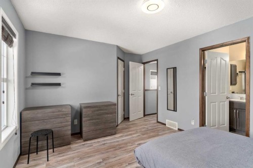 210 Cranberry Place Se, Calgary, AB - Indoor Photo Showing Bedroom