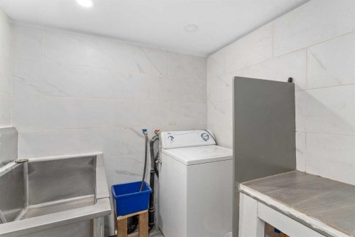210 Cranberry Place Se, Calgary, AB - Indoor Photo Showing Laundry Room