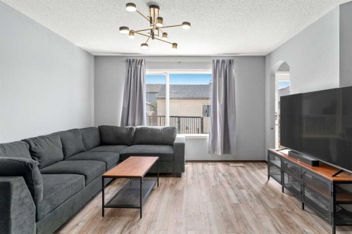 210 Cranberry Place Se, Calgary, AB - Indoor Photo Showing Living Room