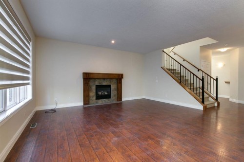186 Copperfield Close Se, Calgary, AB - Indoor With Fireplace