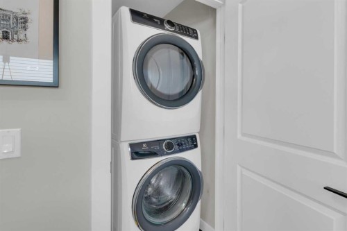 374 Sundown Road, Cochrane, AB - Indoor Photo Showing Laundry Room