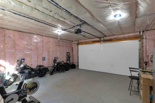 374 Sundown Road, Cochrane, AB - Indoor Photo Showing Garage