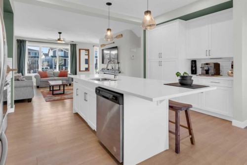 374 Sundown Road, Cochrane, AB - Indoor Photo Showing Kitchen With Upgraded Kitchen