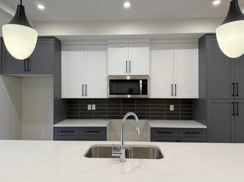 334 Sundown Road, Cochrane, AB - Indoor Photo Showing Kitchen