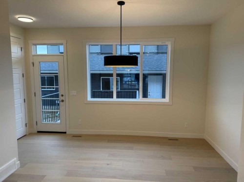 334 Sundown Road, Cochrane, AB - Indoor Photo Showing Other Room