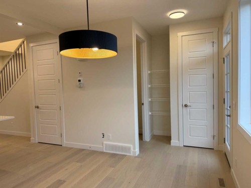 334 Sundown Road, Cochrane, AB - Indoor Photo Showing Other Room