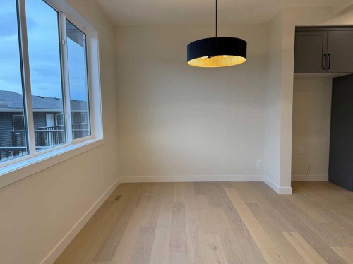 334 Sundown Road, Cochrane, AB - Indoor Photo Showing Other Room